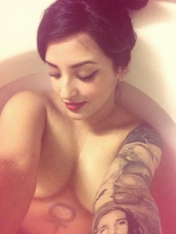 MFC Kory Minx taking a relaxing bath