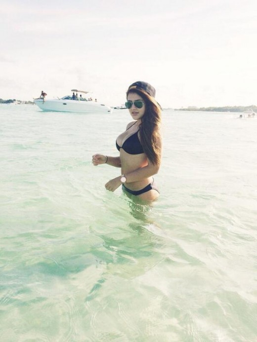 Princess Lauren in Miami in sea wearing sexy black bikini